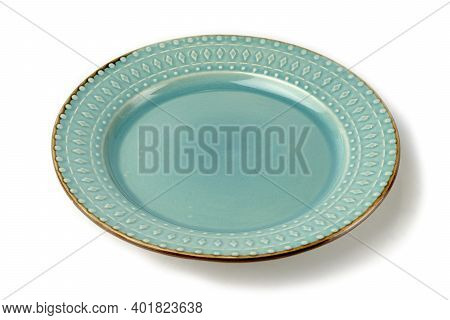 Empty Ceramic Plate Of Delicate Bed Aquamarine Turquoise Color With A Gold Border Isolated On A Whit