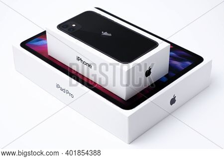 Iphone 11 And Ipadpro Boxes Isolated On The White Background. Unboxing Process, December 2020, San F