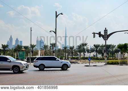 Dubai, Uae - November 16: The Range Rover Velar And Lexus Gx Suvs Are On The Street Of Dubai City On
