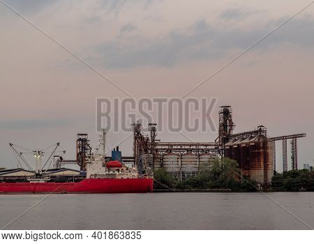 A Cargo Ship Parked In Front Of The Fish Quarantine And Inspection Regional Center At Bang Krachao T