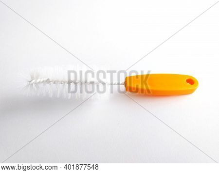 House Cleaning Scrubbing Brush Tool Isolated On White Background. Elegant And Original Orange Dish C