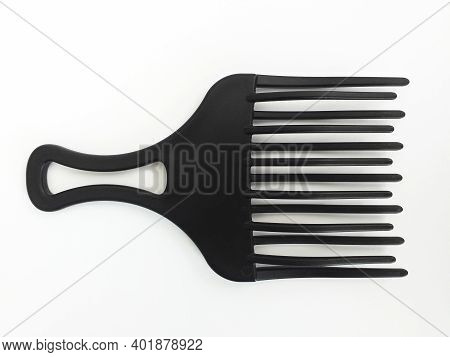 Aerial View Of Black Thick Black Afro Comb Isolated On White Background. Straightening Brush With Wi