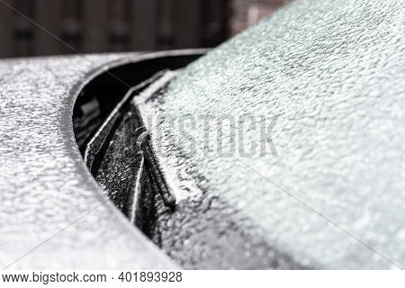 Icy Car, Ice Scraping. Car In Ice, Winter Froze.