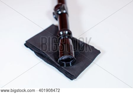 A Compact, 3x9 Magnification Scope Sits On A White Background, Ready To Be Mounted On A Rifle To Hel
