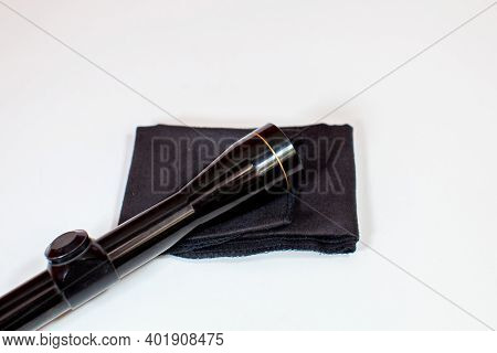 A Compact, 3x9 Magnification Scope Sits On A White Background, Ready To Be Mounted On A Rifle To Hel