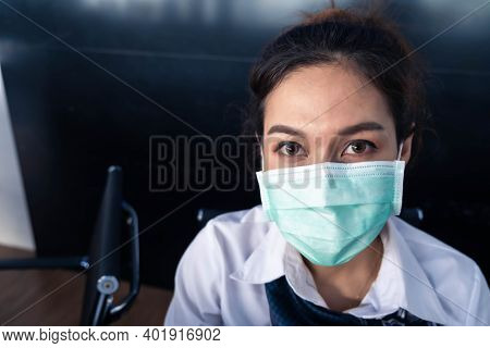 Asian Woman Saleman Wear Surgical Mask Working In Inspector Checking News Covid19 From Smartphone In