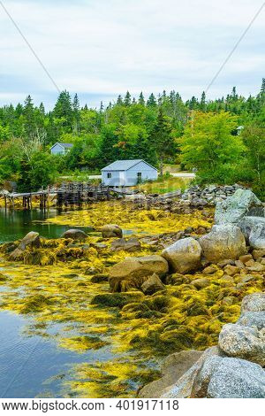 Views Of The Bay, Boats And Waterfront Buildings In The Fishing Village Aspotogan, Nova Scotia, Cana