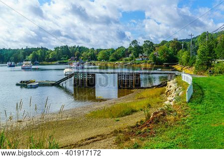Views Of The Bay, Boats And Waterfront Buildings In Head Of Saints, Nova Scotia, Canada