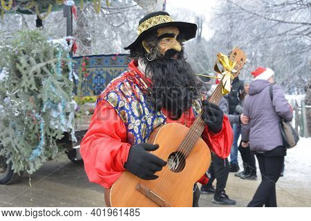 Man Disguised As A Gypsy At A Festive Procession