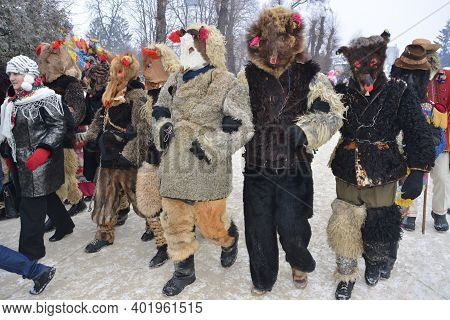 People Disguised As Bears During A Festive Procession To Celebrate Malanka