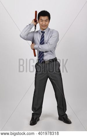 A Business Man With A Double Stick High Quality Photo