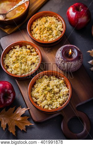 Small apple crambles or apple pies for autumn and winter  
