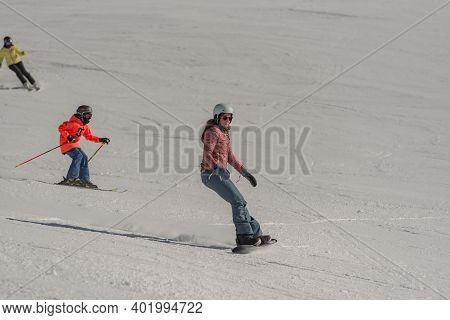Grandvalira, Andorra: 2021 January 03: Young Woman Skiing In The Pyrenees At The Grandvalira Ski Res