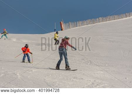 Grandvalira, Andorra: 2021 January 03: Young Woman Skiing In The Pyrenees At The Grandvalira Ski Res