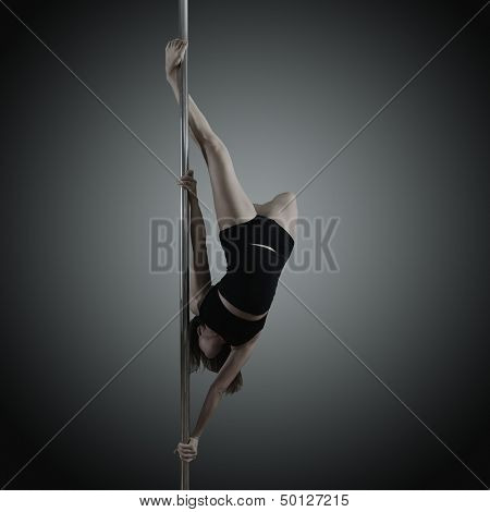 pole dancer, young woman dancing on pylon, toned and noise added