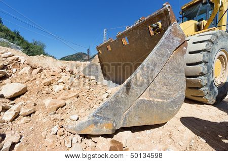 Excavator At Work On Site