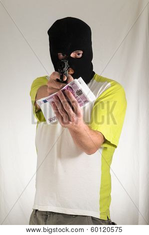 Man Holding a Pistol Gun