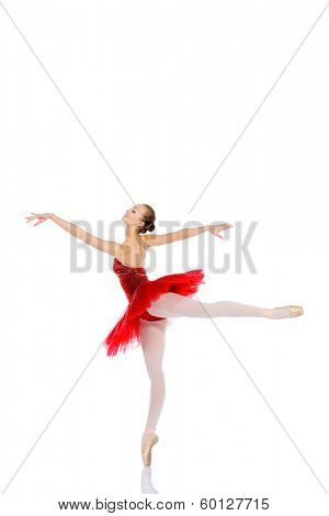 Professional ballet dancer posing at studio. Isolated over white background. 