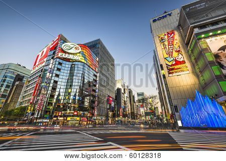 TOKYO, JAPAN - DECEMBER 25, 2012: Sukiyabashi Crossing at the Ginza. Ginza extends for 2.4 km and is one of the world's premiere shopping districts.