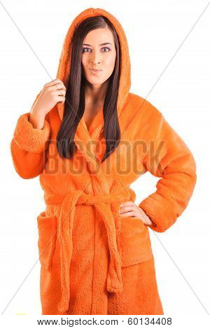 cute brunette in an orange bathrobe