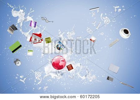 Conceptual image with business items flying in air