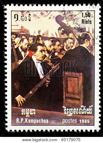 KAMPUCHEA-CIRCA 1985: A stamp printed in the Cambodia, depicts Opera Orchestra, by Degas, circa 1985 