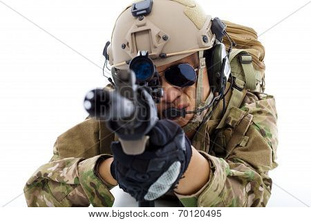 Closeup Of Soldier  Lying On Floor With Rifle  Over White