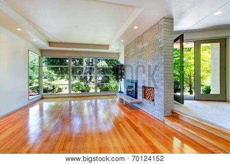 Empty House Interior. Living Room With Glass Wall And Brick Wall