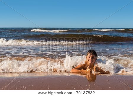 Boy Is Having Fun On Beach