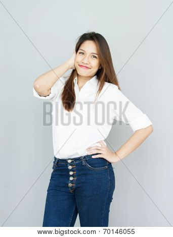 Potrait Asian Lady Mini Smile In Casual Suite White Shirt And Blue Jeans
