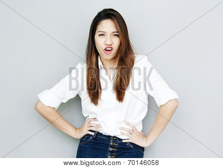 Potrait Asian Lady Mini Smile In Casual Suite White Shirt And Blue Jeans