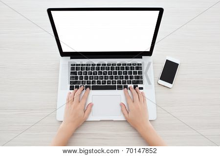 Female Hands Typing On A Laptop Keyboard