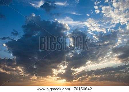 Cloudscape With The Sun Rays Radiating From Behind The Cloud