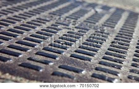 Close Up Of The Metal Manhole Cover
