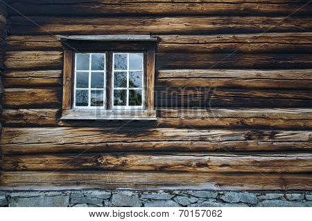 Dark timbered wooden wall with window