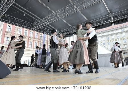 ZAGREB, CROATIA - JULY 19: Members of folk groups Nograd  from Salgotarjan, Hungary during the 48th International Folklore Festival in center of Zagreb, Croatia on July 19, 2014