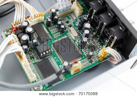 close up electronic digital circuit board part of DVD player