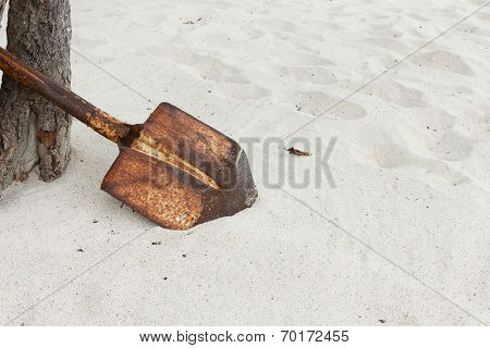 Rust Shovel On The Beach