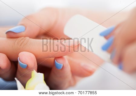 Woman Undergoing Manicure Process
