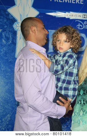 LOS ANGELES - NOV 19: Hank Baskett, Hank Baskett IV at the premiere of Walt Disney Animation Studios' 'Frozen' at the El Capitan Theater on November 19, 2013 in Los Angeles, CA