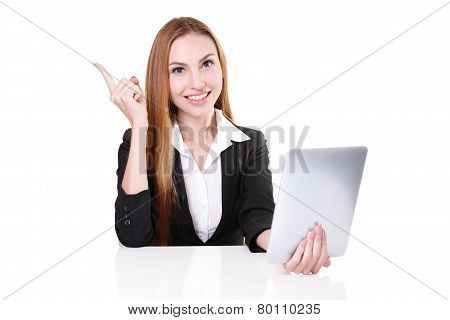 Business Woman Sitting At The Table