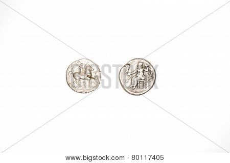 Two Ancient Silver Coins On White Background