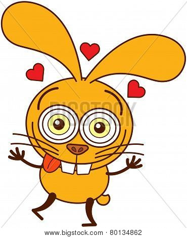 Cute yellow bunny feeling madly in love