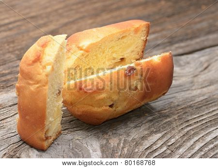 Sliced Penatton Cake On Wooden Background
