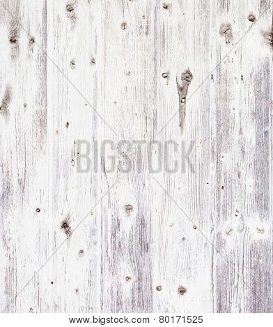 Grunge wooden board painted white.