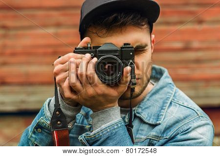 Hipster Photographer with camera