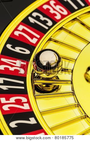 the cylinder of a roulette gambling in a casino. winning or losing is decided by chance.