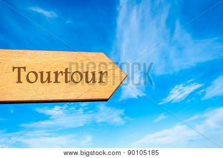 Wooden arrow sign pointing touristic destination