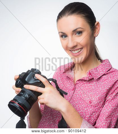 Smiling Photographer With Digital Camera