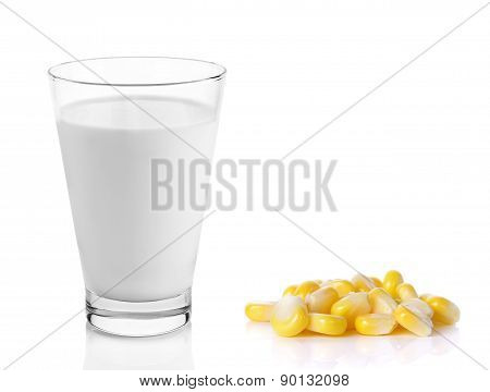 Fresh Milk In The Glass With Corn On White Background